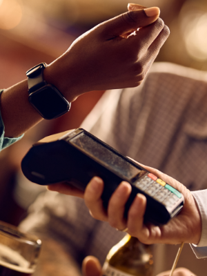 Woman paying with Apple Watch